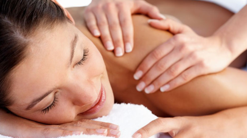 Female getting back massage at HCL Healing Center