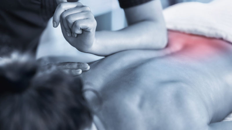 Back pain relief through massage at HCL Healing Center